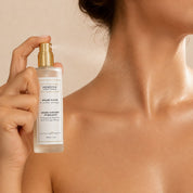 Applying La Brume Divine Hendiya® to the skin, orange blossom mist