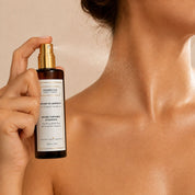 Applying Brume de Sérénité Hendiya® to the skin, neroli mist