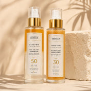 Sun duo by Hendiya, L'Huile Dorée SPF 30 and L'Eau d'Été SPF 50+ with carrot extract